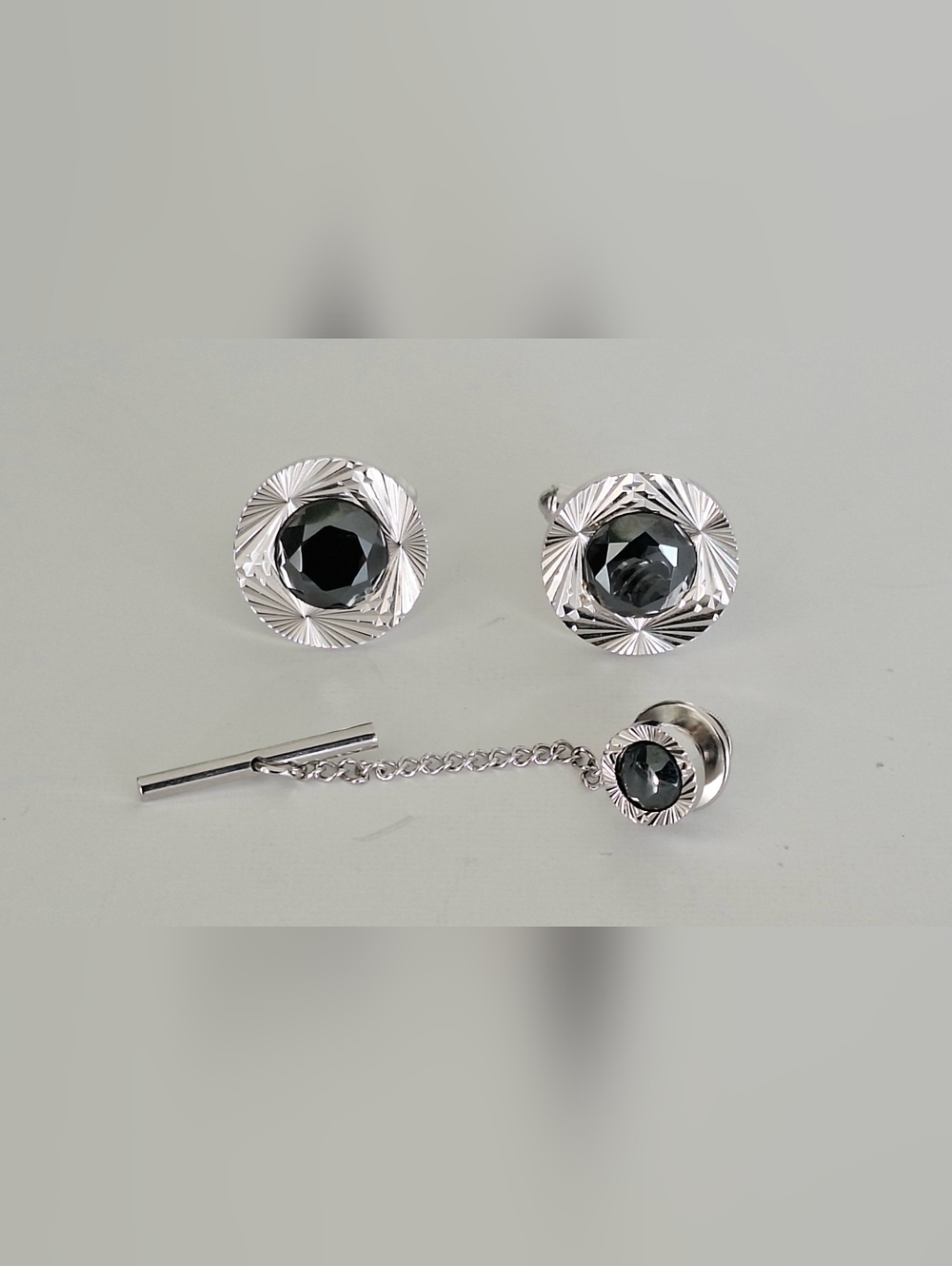 Senator cufflinks and a tie clip